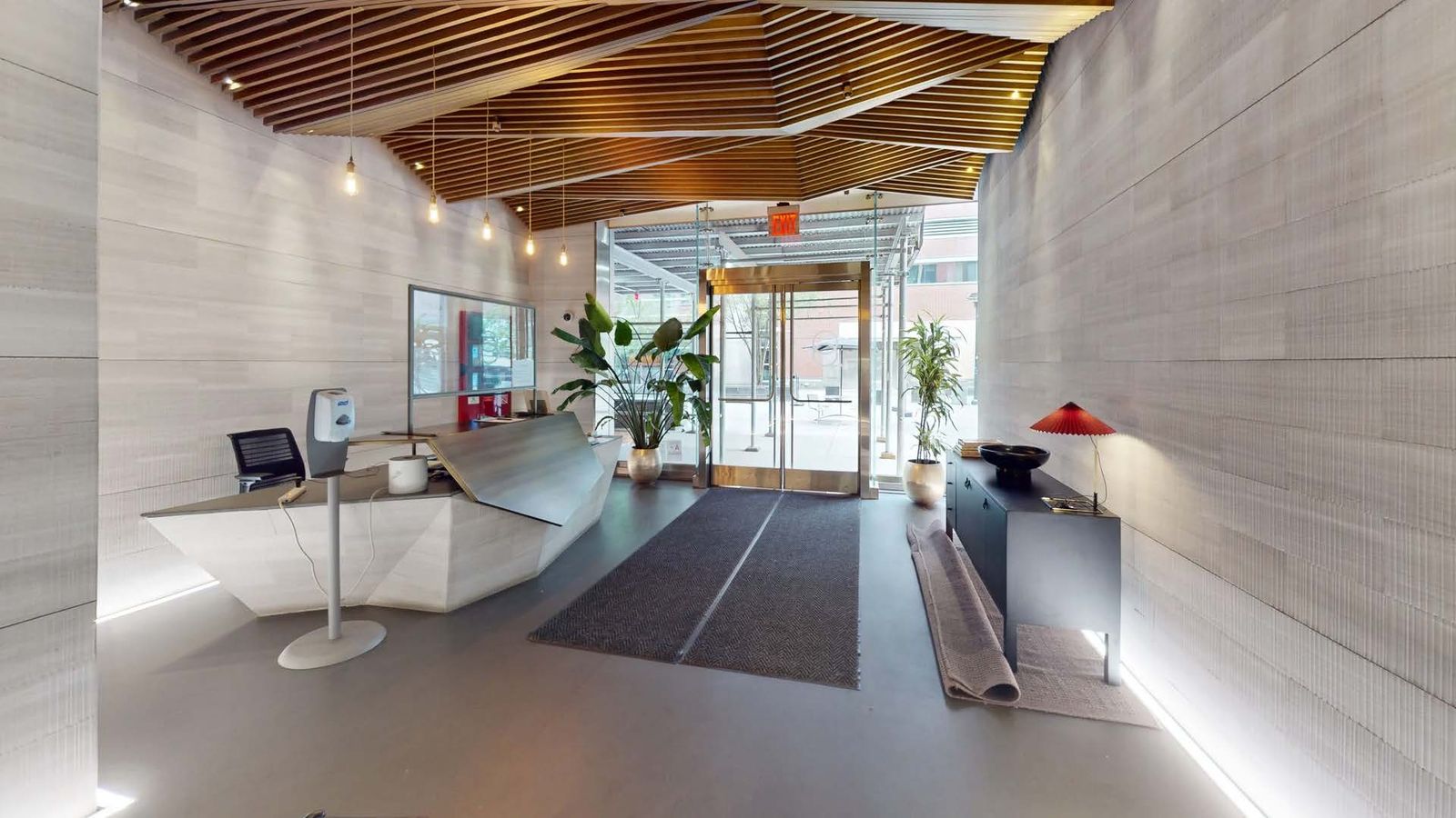Lobby looking out through the glass doors to the East 25th Street entrance